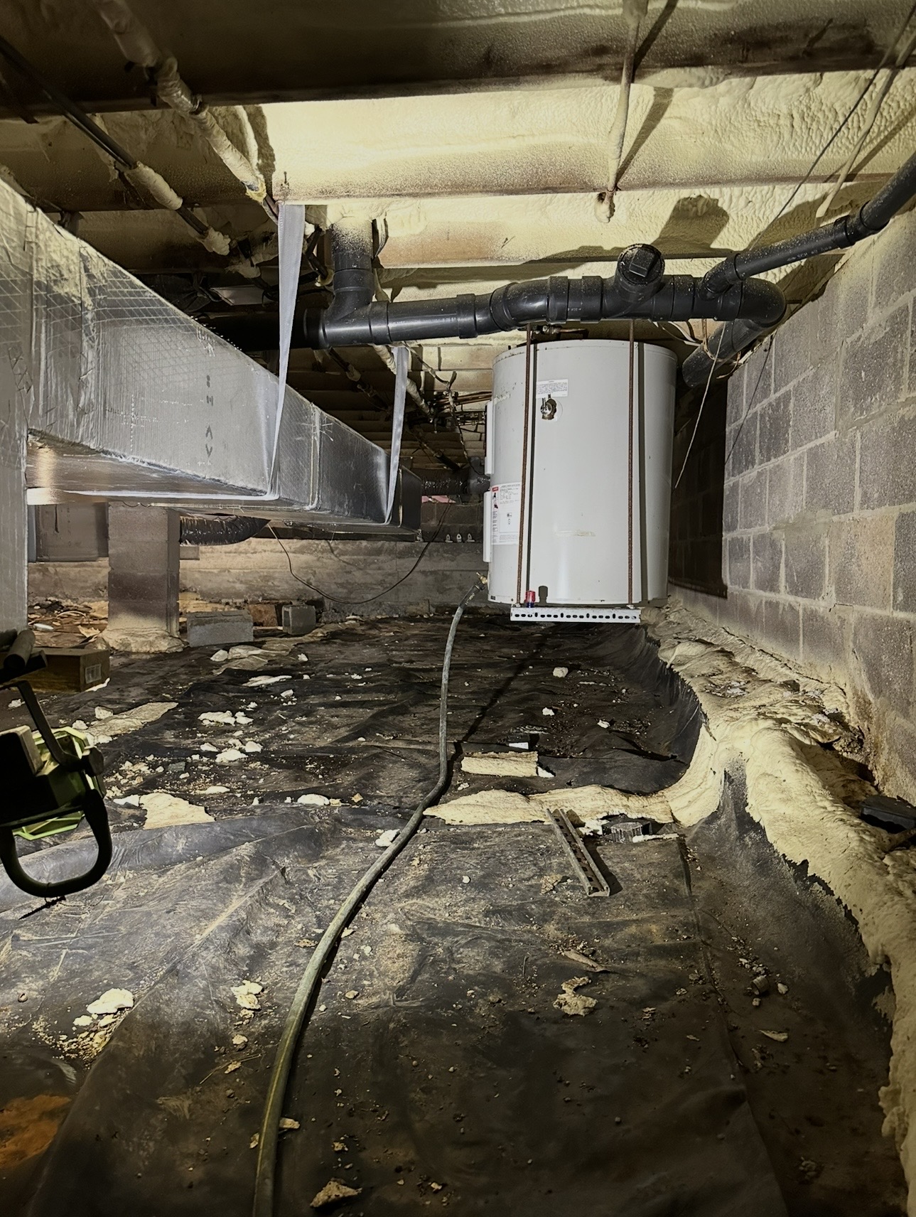 Before: Dirty Basement with Water Heater → Clean Encapsulated Space